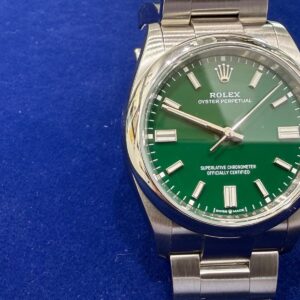 Rolex Oyster Perpetual anno 2024, quadrante verde, automatico, diametro 36mm, completo di scatola e garanzia.